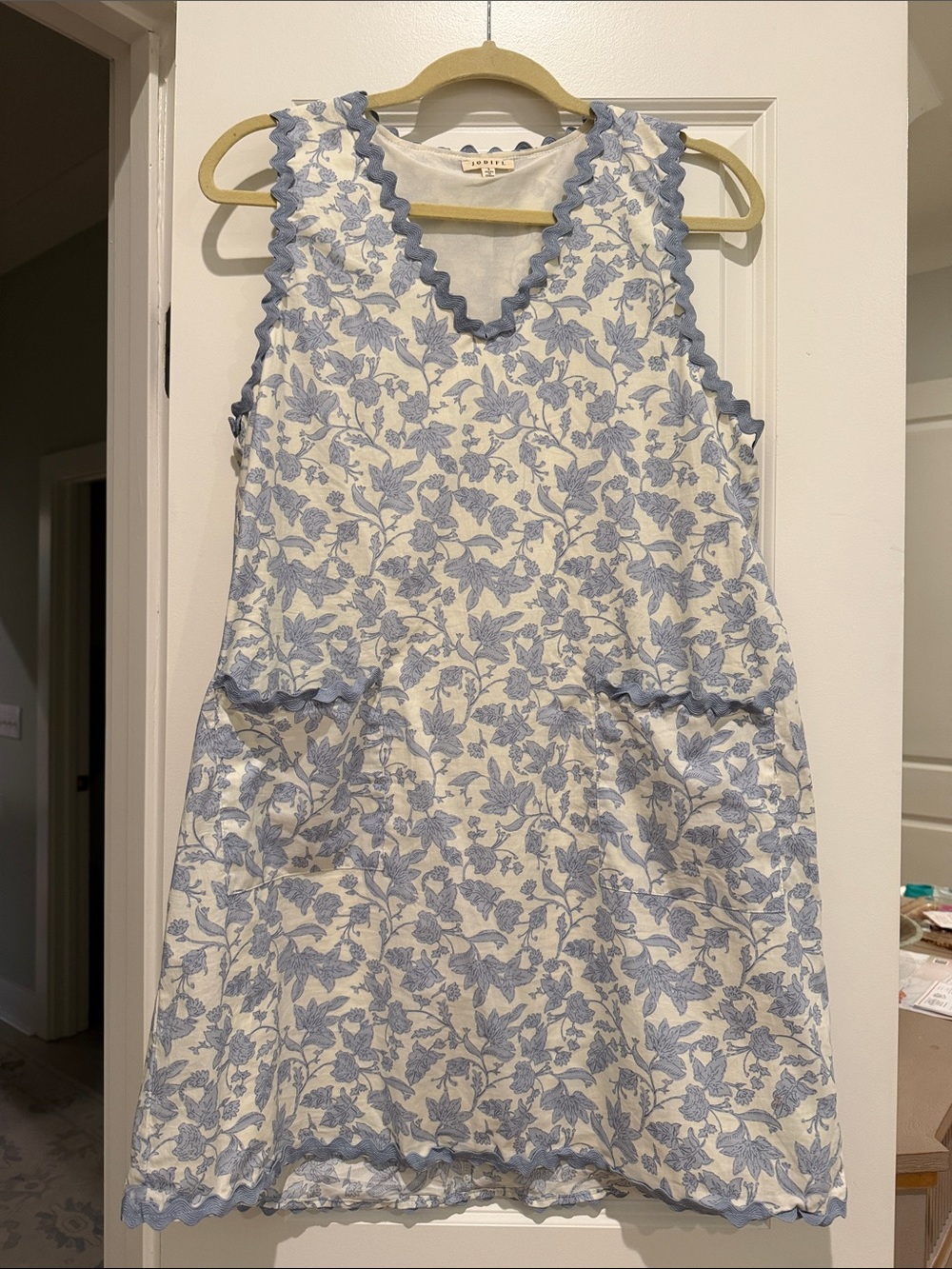 Sleeveless Cream Dress with Blue Floral Print and Scalloped Trim